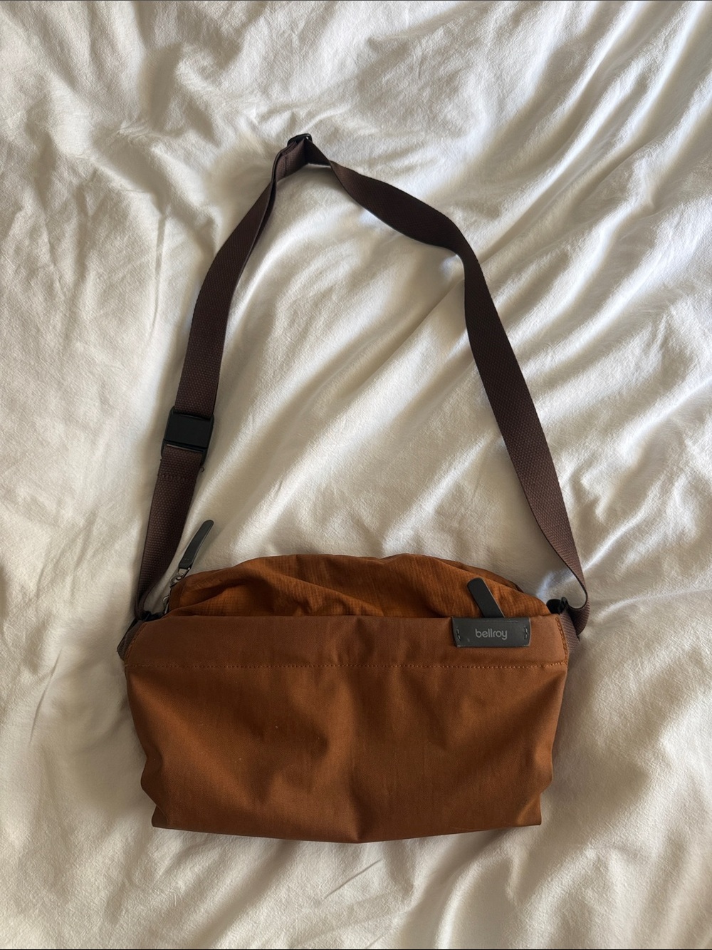 Bellroy mini sling—bronze color